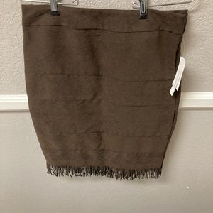 Women’s Dark Brown Suede with fringe at the bottom skirt. Size 5
